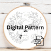 close-up-embroideryed-picture-raccoon-pumpkin