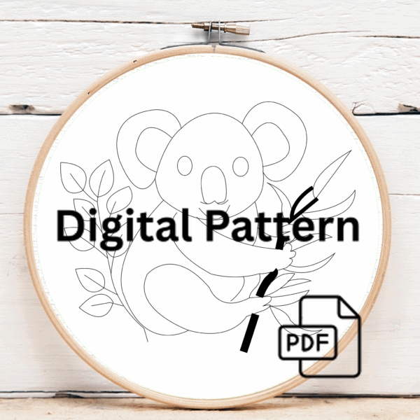 close-up-person-holding-embroideryed-koala-hoop
