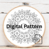 close-up-person-holding-embroideryed-sunflower-hoop