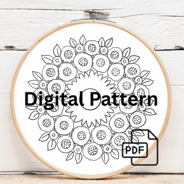 close-up-person-holding-embroideryed-sunflower-hoop