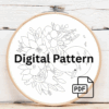 arafed-embroidery-black-bird-sitting-branch-flowers