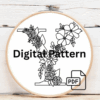 arafed-embroidery-letter-v-bow-brown-background
