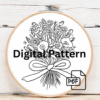 embroidery-bouquet-flowers-ribbon-brown-surface