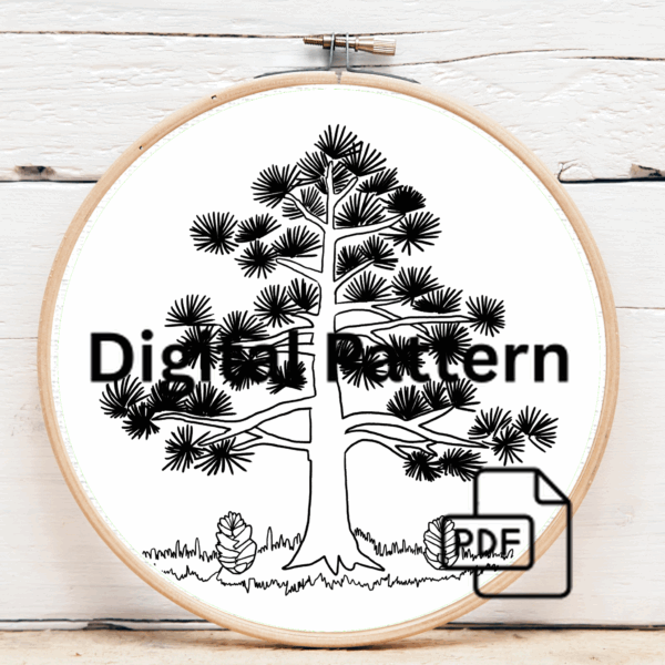 embroidery-pine-tree-pine-cones-wooden-surface