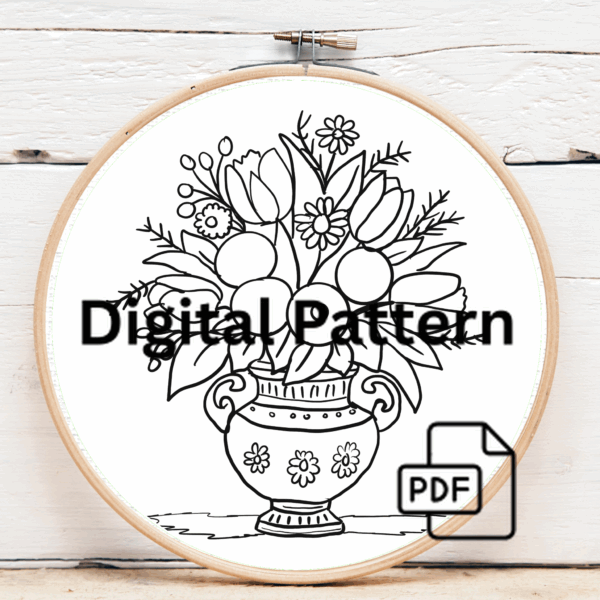embroidery-vase-flowers-being-held-by-person