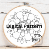 embroidery-circular-design-flowers-white-surface