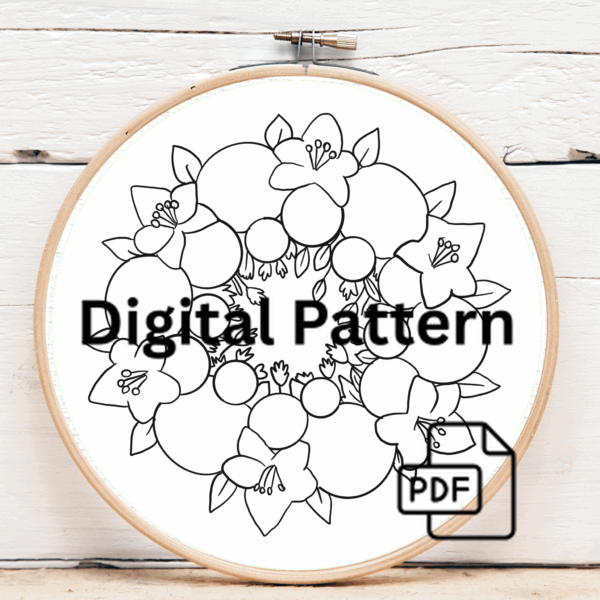 embroidery-circular-design-flowers-white-surface