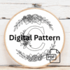 close-up-cross-stitched-monogram-ribbon