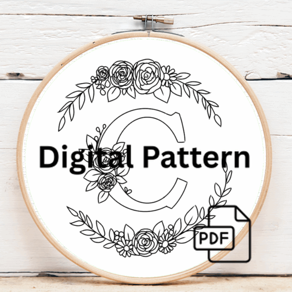 close-up-cross-stitched-monogram-ribbon