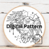 close-up-cross-stitched-picture-bird-key