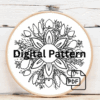 close-up-cross-stitched-picture-blue-flower