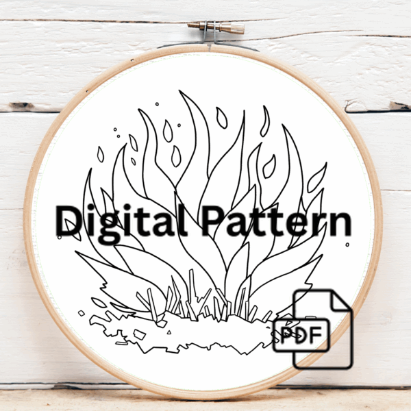 close-up-cross-stitched-picture-fire