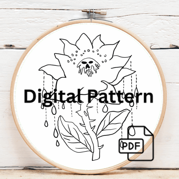 close-up-cross-stitched-picture-flower-green-leaves